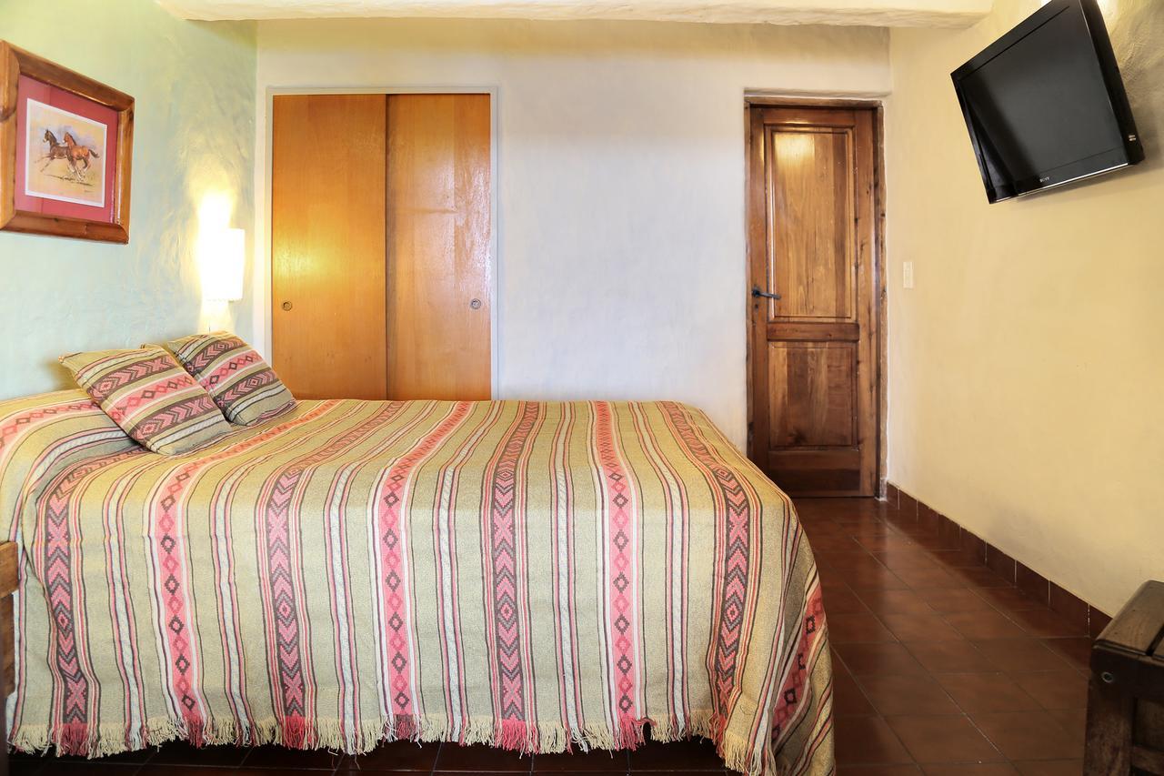 סן קרלוס דה ברילוצ'ה La Caleta Bungalows מראה חיצוני תמונה